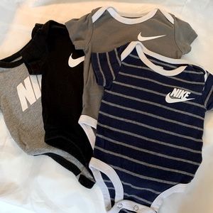 Nike onesie four of them  $20 a size 69 months like new